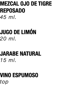 MEZCAL OJO DE TIGRE REPOSADO 45 ml. JUGO DE LIM N 20 ml. JARABE NATURAL 15 ml. VINO ESPUMOSO top